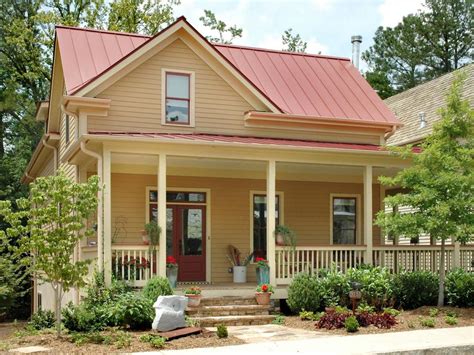 red metal roof on yellow house|tin colors for homes.